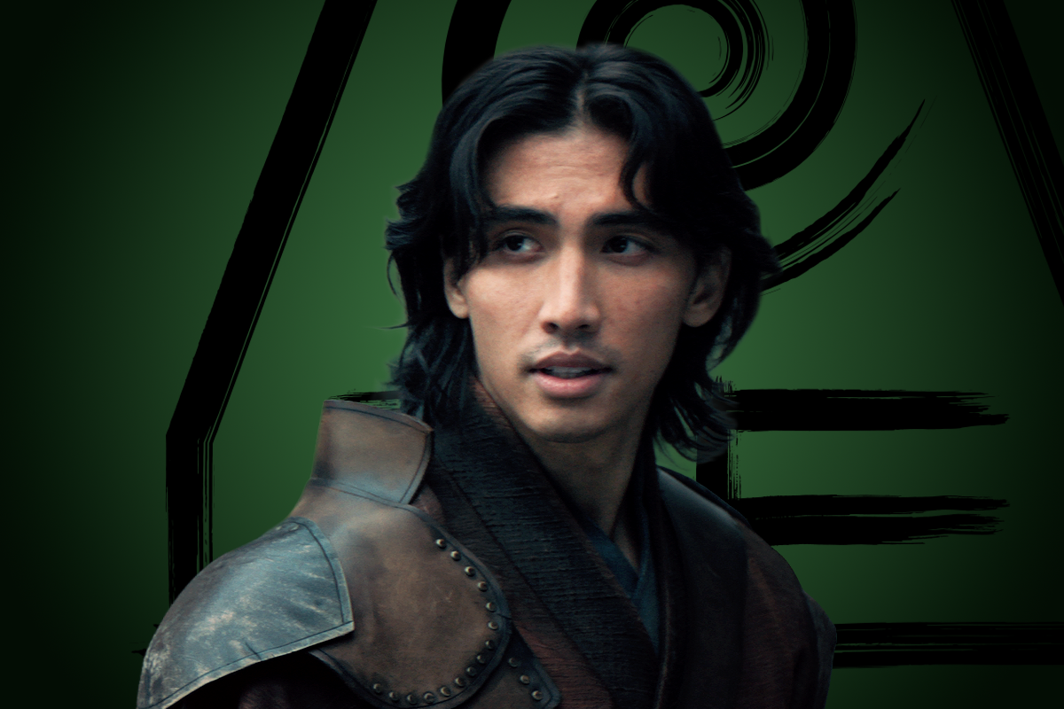 Sebastian Amoruso as Jet in fantasy armor looking to the side, standing before a green background with a bold abstract symbol, evoking a medieval or mystical setting.