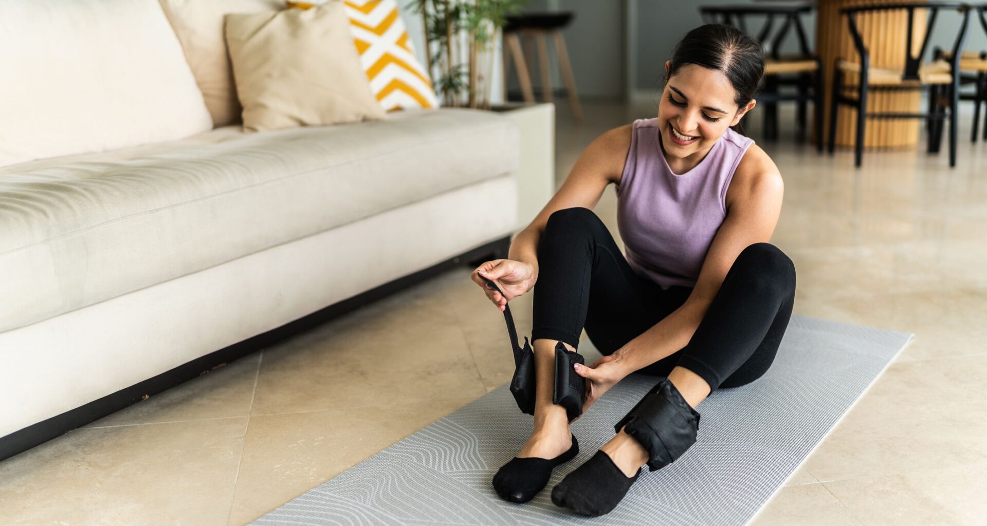 A Pilates master trainer shares her ultimate ankle weight workout to build lower-body strength