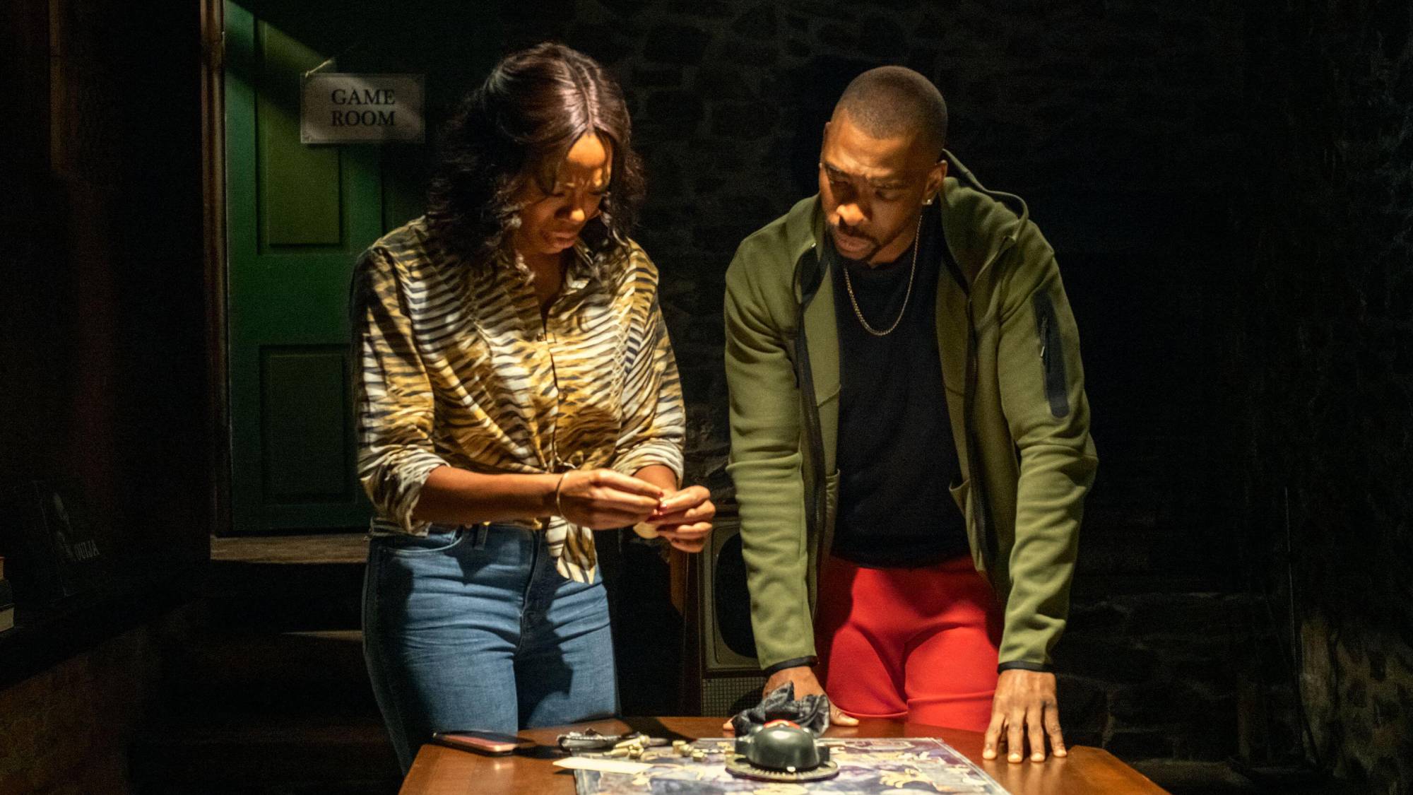 (L-R) Yvonne Orji as Morgan Jay Pharaoh as Shawn in "The Blackening"