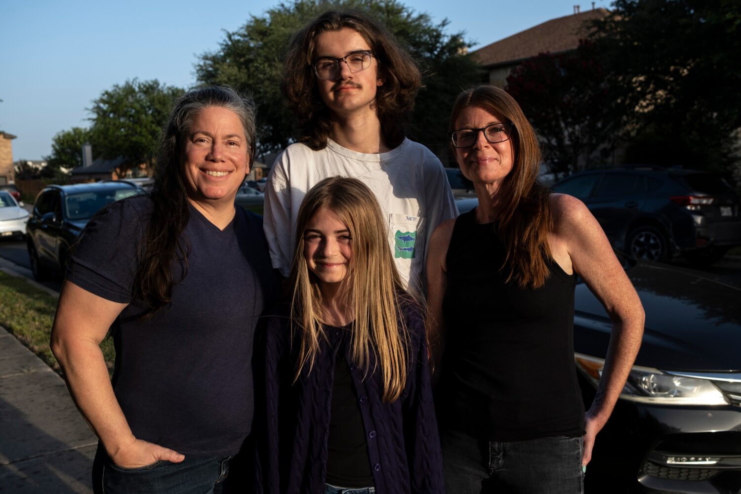 Jamie Corum, her children Ivy Edgar, 10, Cash Edgar, 17, and wife Jessica Edgar-Corum pose for a po...
