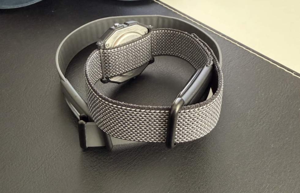 Fitbit Air attached to a Timex Watch