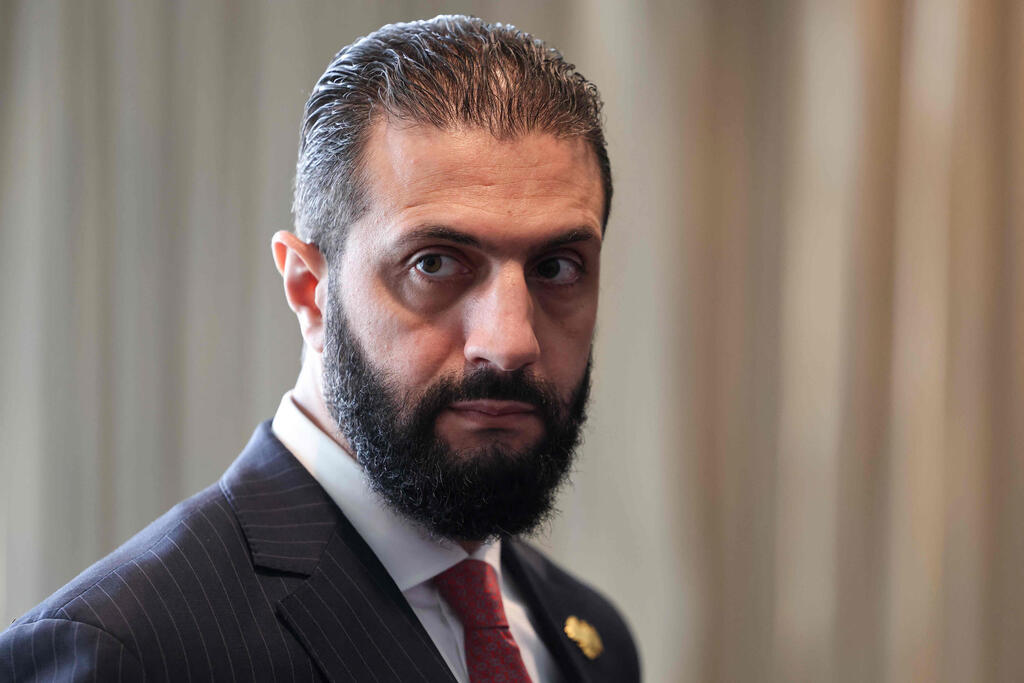 Syrian President Ahmad al-Sharaa (Photo: Ludovic MARIN / POOL / AFP) אל ג'ולני, נשיא סוריה, בעצרת הכללית של האו"ם בניו יורק