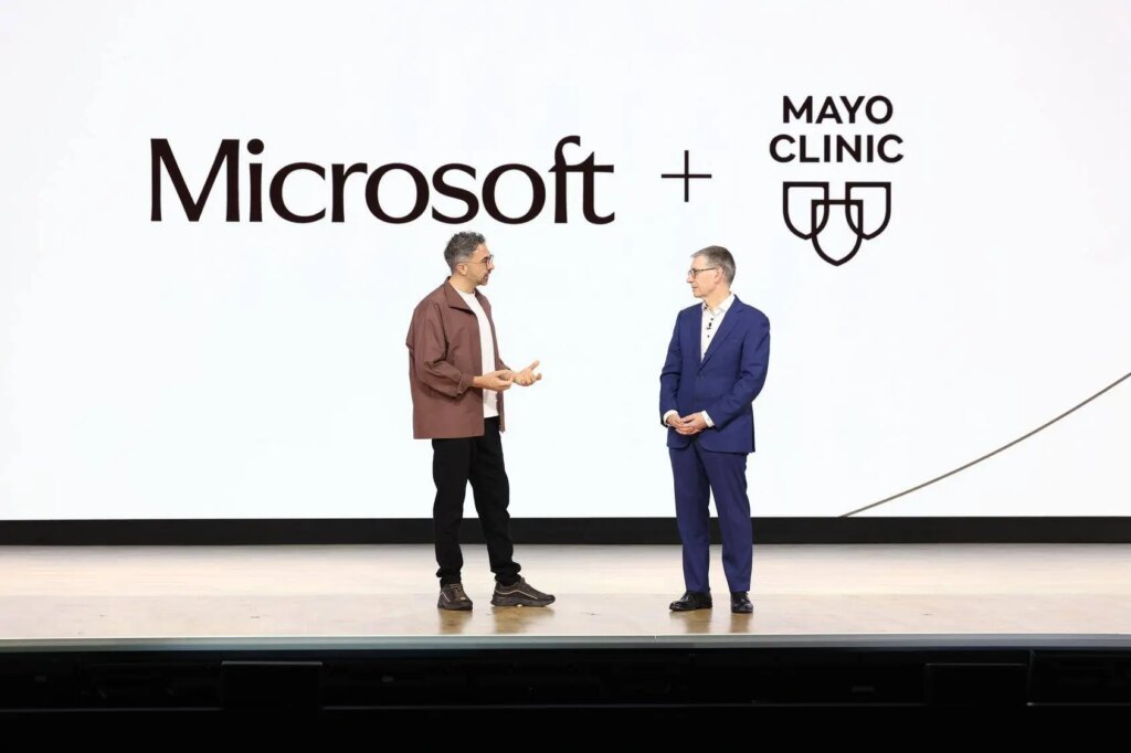 Mustafa Suleyman, CEO of Microsoft AI, and Gianrico Farrugia, M.D., president and CEO, Mayo Clinic