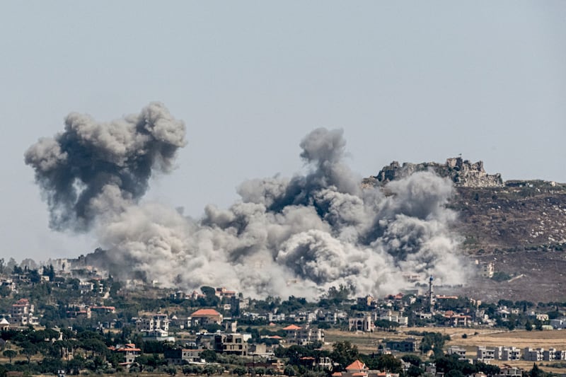 Smoke rises from Israeli air strikes in front of Beaufort Castle in Nabatieh, Lebanon, on June 4. Photograph: Daniel Berehulak/The New York Times
                      