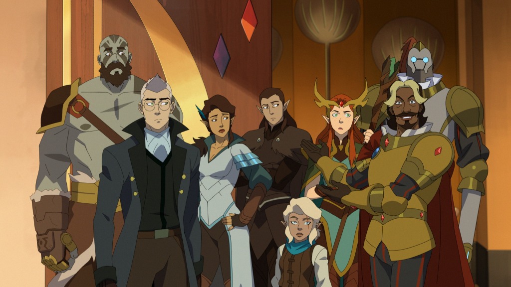 The members of Vox Machina stand together and look at Taryon Darrington, a fancy lad in gold armor.