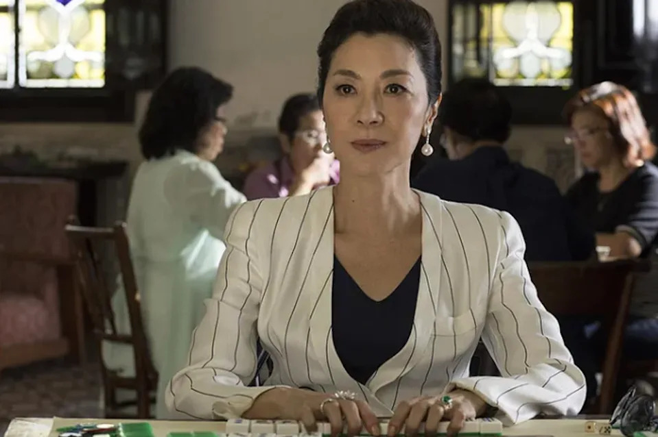 Malaysian actor Michelle Yeoh playing mahjong in ‘Crazy Rich Asians’ (Warner Bros)