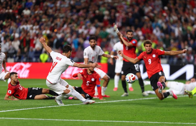 SEATTLE, WASHINGTON - JUNE 26: Shoja Khalilzadeh #4 of IR Iran scores his team's second goal that was ruled offside following a VAR review during the FIFA World Cup 2026 Group G match between Egypt and IR Iran at Seattle Stadium on June 26, 2026 in Seattle, Washington. Dean Mouhtaropoulos/Getty Images/AFP (Photo by Dean Mouhtaropoulos / GETTY IMAGES NORTH AMERICA / Getty Images via AFP)