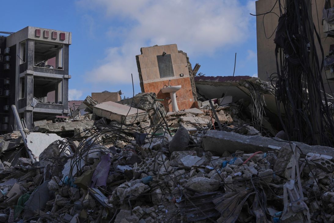 A bathroom mirror and sink remain standing amid the rubble of buildings damaged by Israeli strikes near the Jabal Amel Hospital in the southern port city of Tyre, Lebanon, on June 18, 2026.