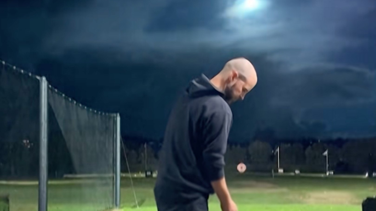Sydney golfer captures rare meteor fireball streaking over ocean during practice swing