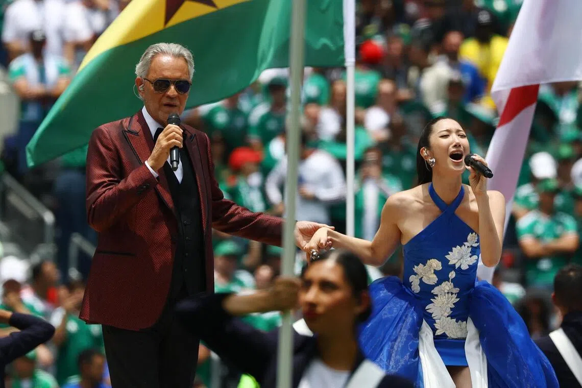 Singers Andrea Bocelli (left) and Ejae performing during the pre-game show before the opening match of the FIFA World Cup 2026 between Mexico and South Africa in Mexico City, Mexico, June 11 June, 2026.