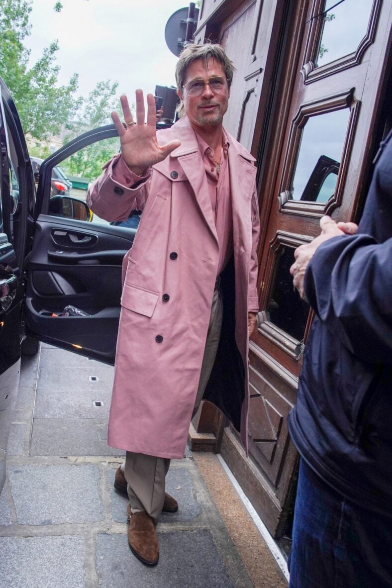 Brad Pitt wears pink trench coat to dinner in Paris
