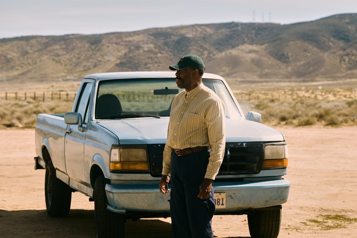 Colman Domingo as Ali Muhammed in front of a truck in the desert in Euphoria season 3.