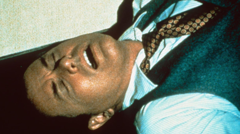 JR Ewing lying in pain