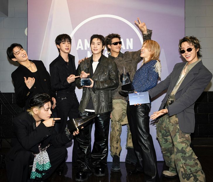 K-pop boy group BTS poses after winning the Artist of the Year for the second time at the American Music Awards, at MGM Grand Garden Arena in Las Vegas, May 25. Courtesy of BitHit Music
