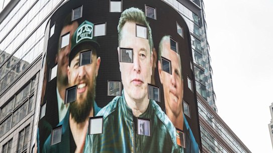 Elon Musk, founder of SpaceX, pictured on a screen in Times Square during the company’s IPO celebrations. He is now the world’s first trillionaire.