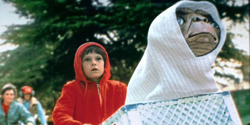 Elliott, played by Henry Thomas, bikes with E.T. in his bicycle basket in 'E.T. the Extra-Terrestrial'.