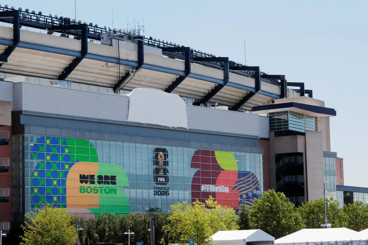 A photo of the covered Gillette logo on a football stadium