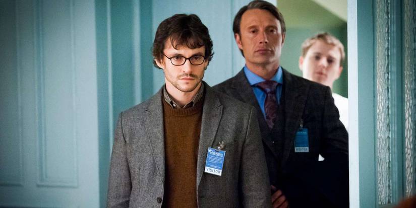 Will Graham (Hugh Dancy) walks into a room tailed by Dr. Hannibal Lecter (Mads Mikkelsen) in Hannibal.