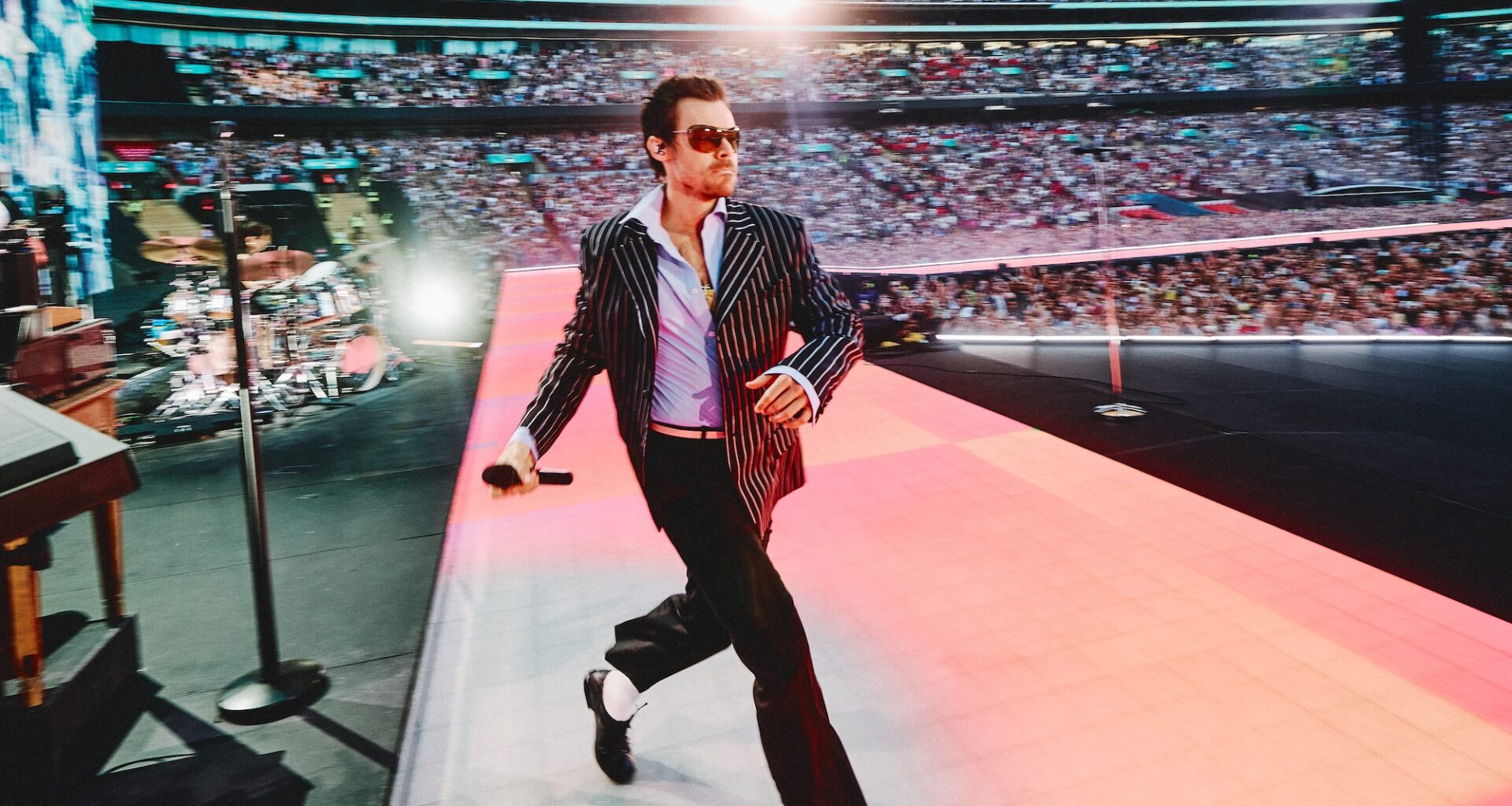 Harry Styles pays tribute to David Hockney and reflects on One Direction days as he kicks off record-breaking Wembley run