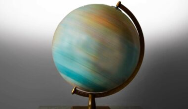 Photo of a model globe spinning so fast you cannot make out any countries or continents