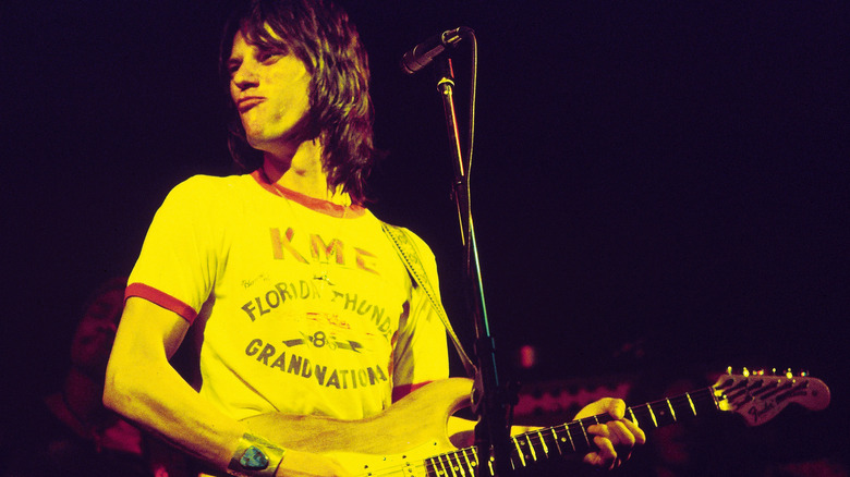 Jeff Beck onstage with guitar