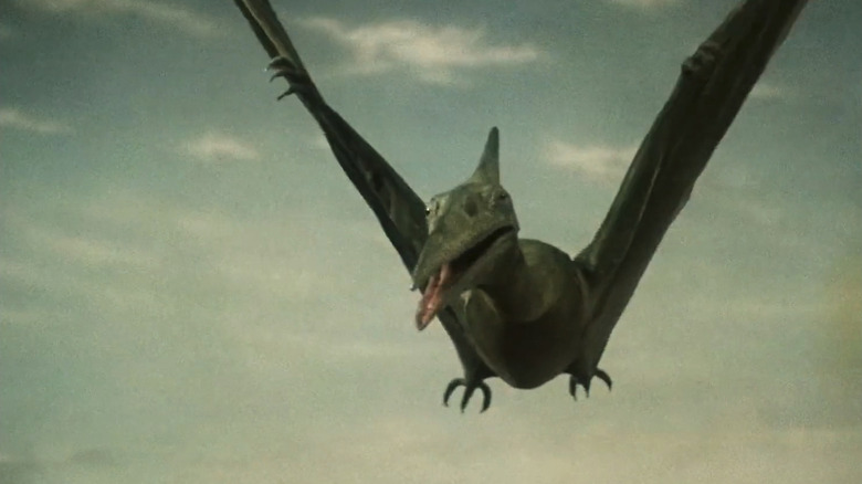 A Pterosaur flies through the sky in Journey to the Beginning of Time