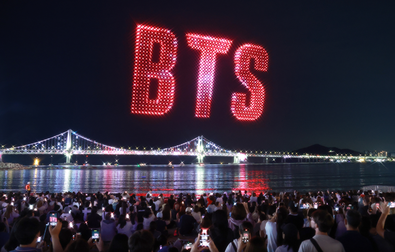 In tandem with "BTS The City Arirang — Busan," a drone light show takes place at Gwangalli Beach in Busan on Friday. (Yonhap)