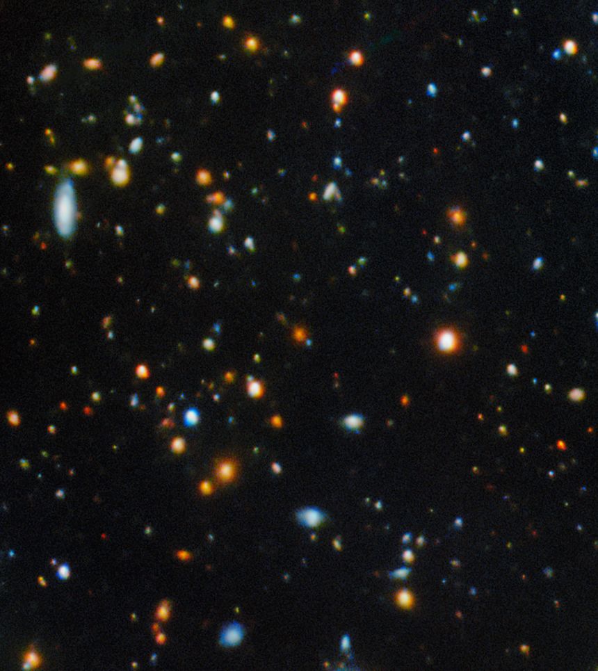 The Shadow Blaster galaxy is behind the bright red galaxy at the center of this image.