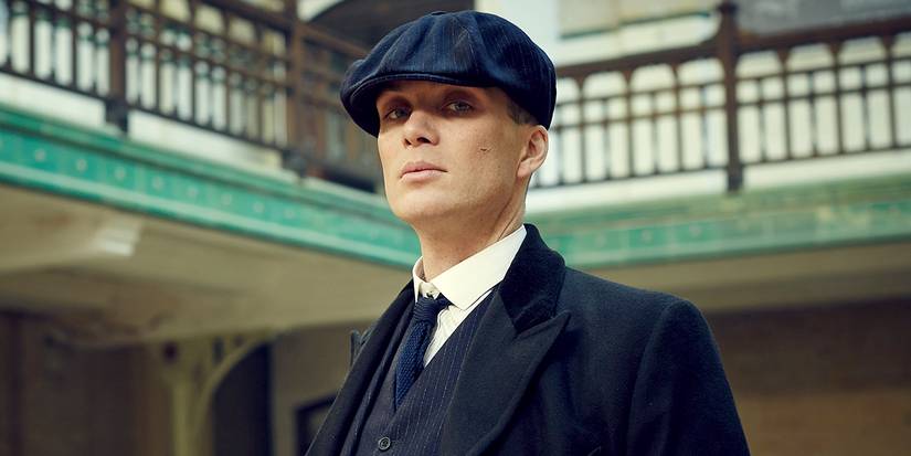 Cillian Murphy as Tommy Shelby looking at the camera in Peaky Blinders.
