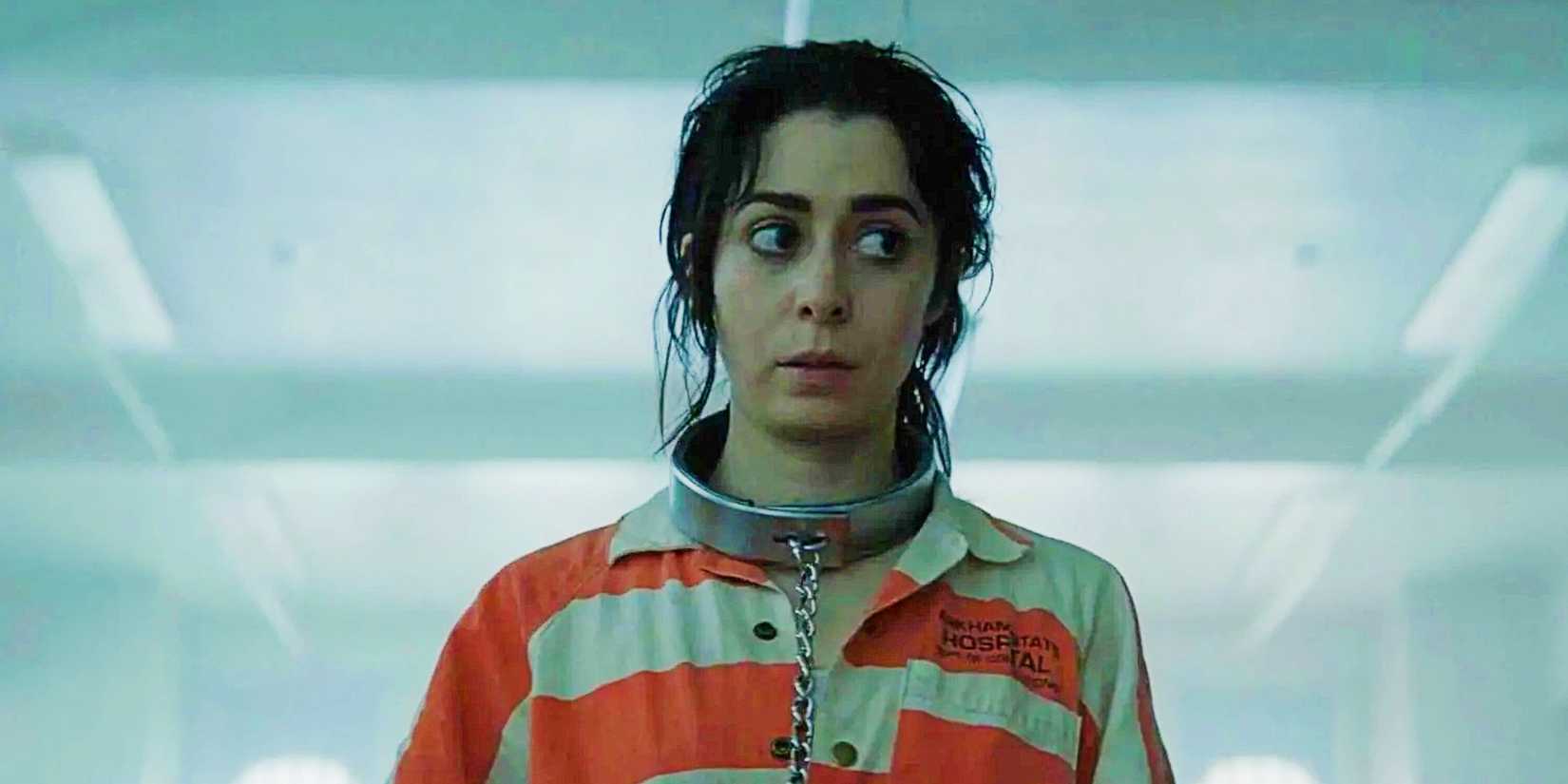Cristin Milioti as Sofia Falcone in a prison uniform with a cuff around her neck in The Penguin "Cent'Anni"
