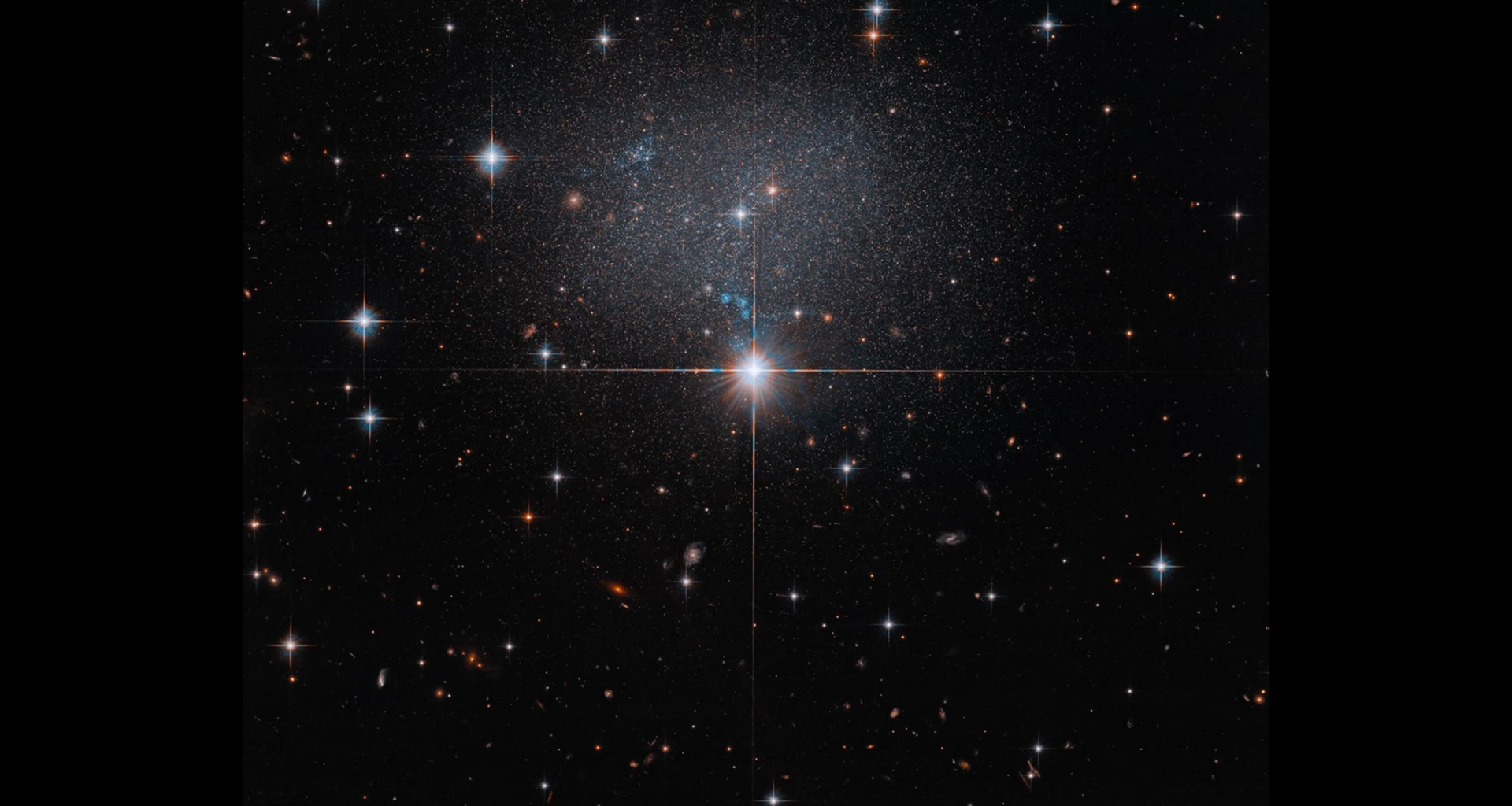 Hubble spies a swarm of stars in a strange, irregular galaxy photo of the day for 15, 2026