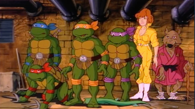 The Teenage Mutant Ninja Turtles, April O'Neil, and Splinter.