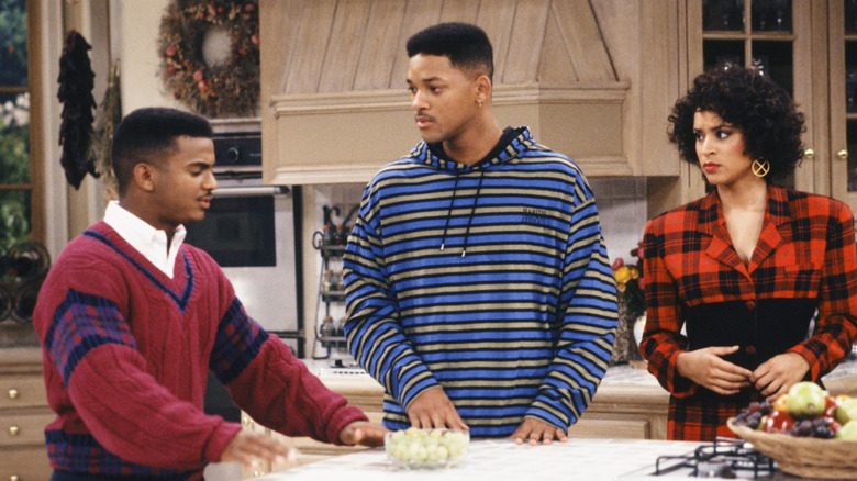 Carlton, Will, and Hilary have a conversation in kitchen