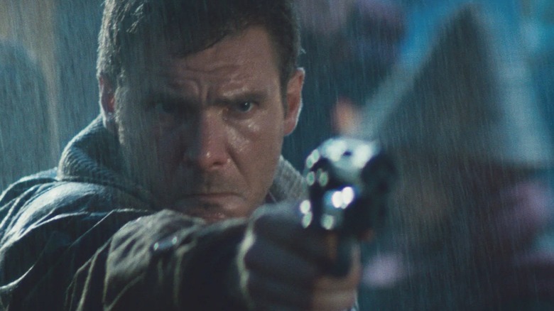 Deckard aiming his gun