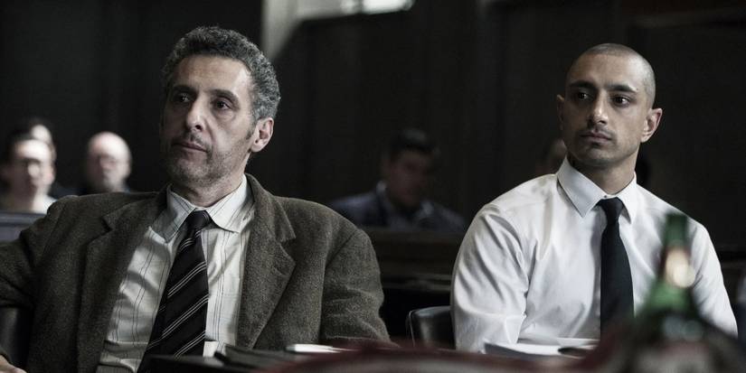 DA John Stone (John Turturro) sits in court with his client Nasir Khan (Riz Ahmed) in 'The Night Of' (2016).