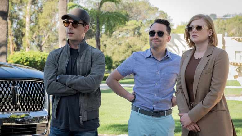 Kendall, Roman, and Shiv Roy wearing sunglasses