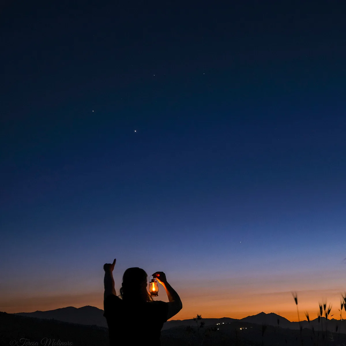 Venus and Jupiter are the stargazing event of the moment, and this week, Monday and Tuesday evening, they're at their closest point together. The planet pair are visible in the western sky after sunset, and look like the two brightest stars in the early evening sky. Teresa Molinaro captured this view of Venus, Jupiter and Mercury from Sicily, Italy on 5 June 2026 at 21:16 local time. Venus and Jupiter are the two bright 'stars' above the silhouetted figure, while Mercury is a small dot above the city lights. Teresa says: 