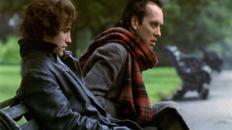 Marwood and Withnail sitting on a park bench in Withnail and I (1987)