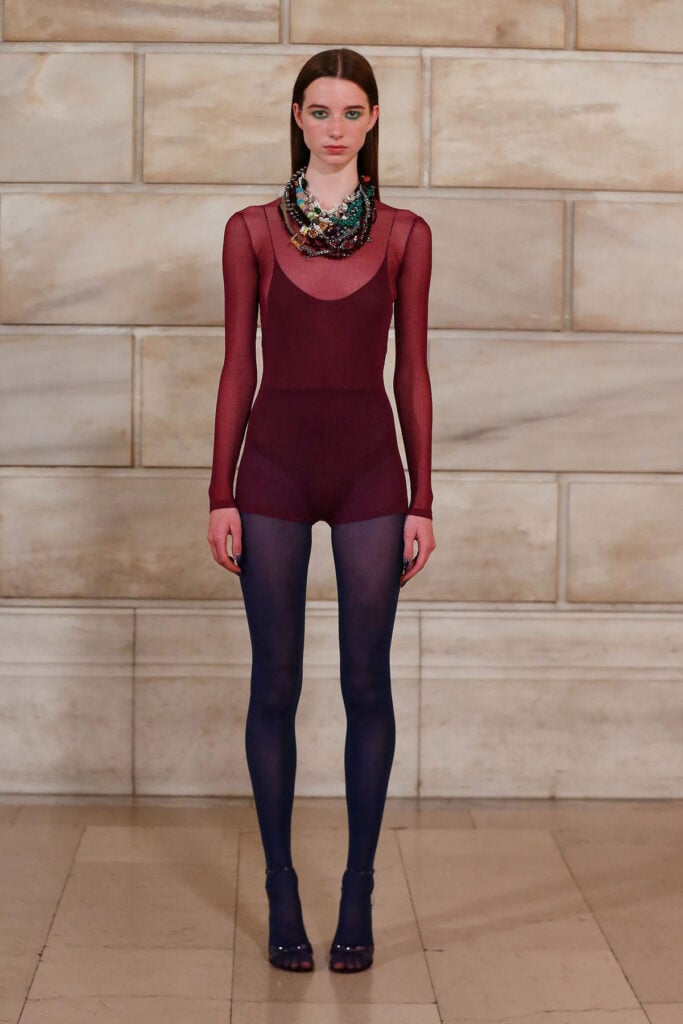 Marc Jacobs Spring 2027 runway layered knit bodysuit with coordinating tights.