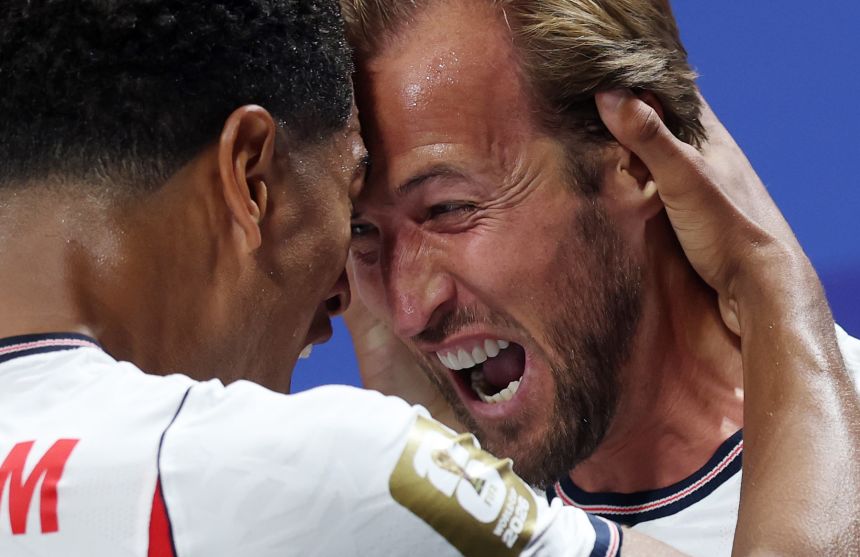 Harry Kane of England celebrates with teammate Jude Bellingham after scoring his team’s first goal against Congo DR at Atlanta Stadium on July 1.