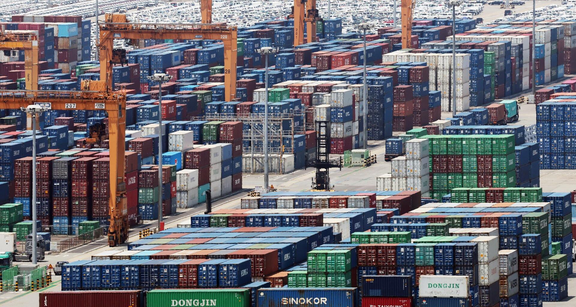 Containers are stacked at a port in Pyeongtaek, around 60 kilometers south of Seoul,  July 1. Yonhap