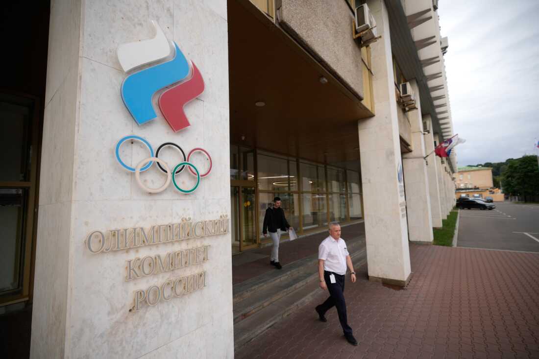 A man walks from the Russian National Olympic Committee building in Moscow, on Tuesday, July 7, 2026.