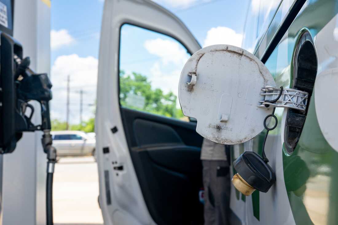 A person prepares to pump gas at a Valero gas station on June 16, 2026 in Austin, Texas.