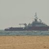 A ship sails off the coast of Ajman, United Arab Emirates, on Friday.