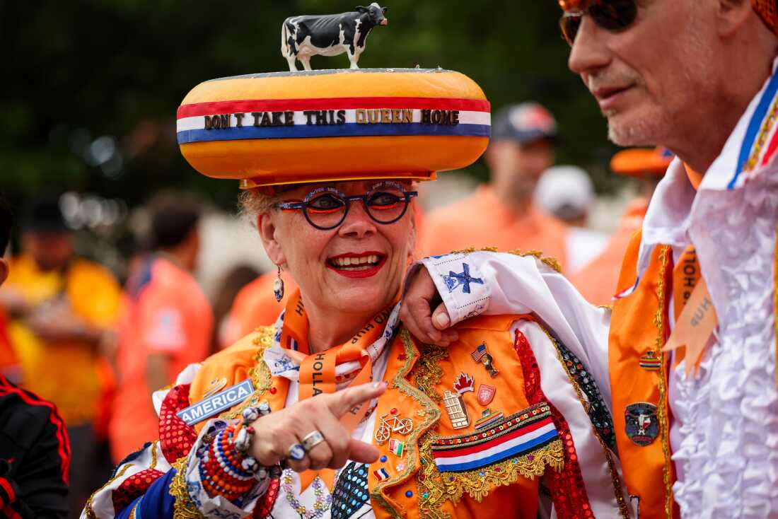 Juydo Janssen and "The Queen of Cheese" dressed up in modified Dutch traditional outfits to symbolize the Netherlands before the World Cup match against Japan on Sunday, June 14, in Arlington, Texas.