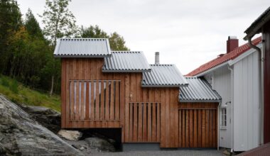 A Timber Extension Climbs the Hillside Behind This Rural Norwegian Home
