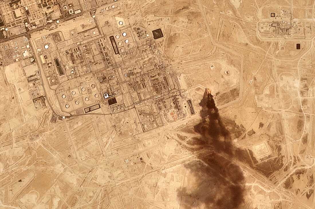 This satellite image provided by Planet Labs PBC on July 27, 2026 shows smoke rising from the Saudi Aramco oil processing facility in Abqaiq, Saudi Arabia, 2026.
