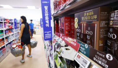 People shop at a supermarket in Seoul, Wednesday. Yonhap