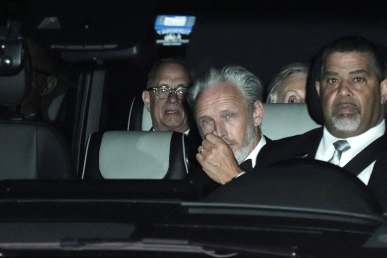 Tom Hanks and Paul McCartney depart Madison Square Garden.