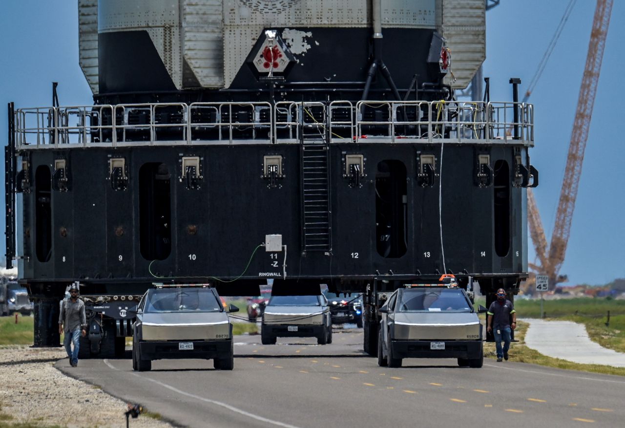 Super Heavy V3 Booster 20 rolls away from Pad 2 on its way to the SpaceX launch production facility in Starbase, Texas, on July 17.